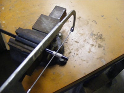 Manually cutting a graphite shaft