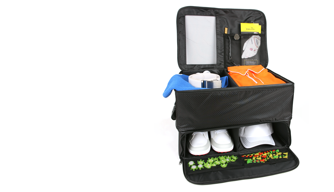 opened Intech Golf Double Row Trunk Organizer with golf shoes, hat, shirt, belt, golf glove and other accessories inside