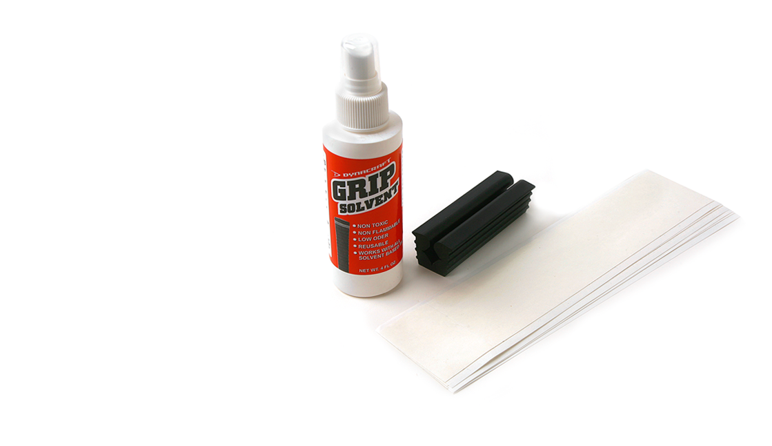 4-ounce bottle of grip solvent, rubber vise clamp and 13 strips of individual tape strips