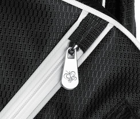 up close detail of the iBell acart bag including a butterfly on the zipper pull