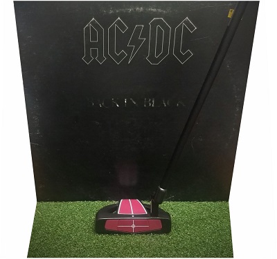 Black putter shaft in a black putter in front of AC DC's Back in Black album