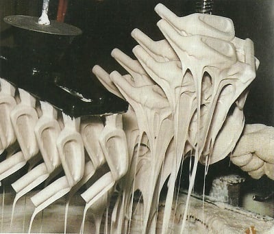 wax trees of golf irons coated in a ceramic slurry