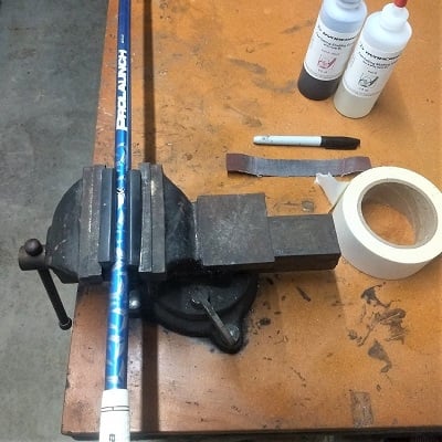 Golf clubmaking workbench with vise and clubmaking supplies