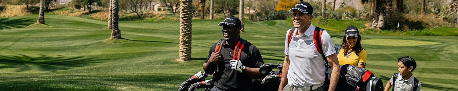 4 golfers of different ages and race carrying Orlimar golf equipment on the golf course