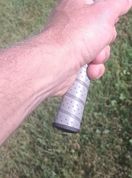 gripping down on a golf club